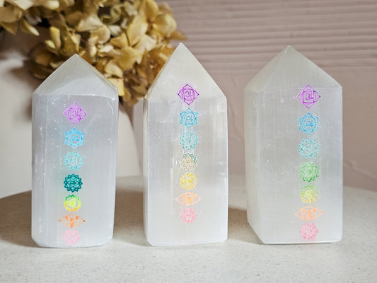 Selenite Tower with Chakra symbols